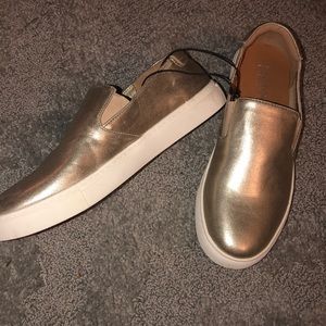 Kenneth Cole slip on shoes.